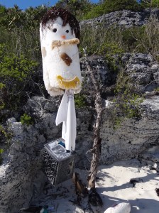 Beach trash scarecrow at Driftwood Beach