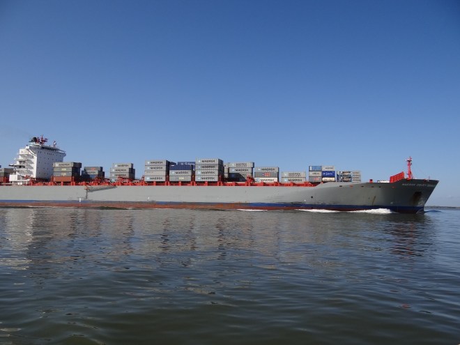 Mr Very Long steams past us up into the harbor