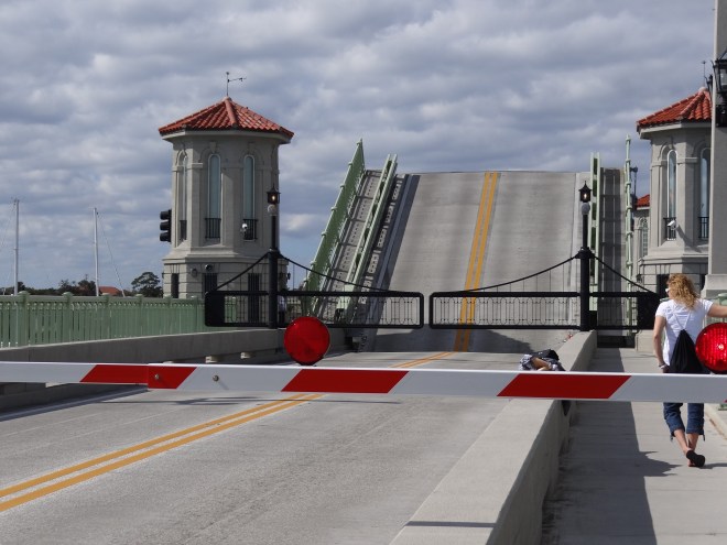 A walking across view of the Bridge of Lions