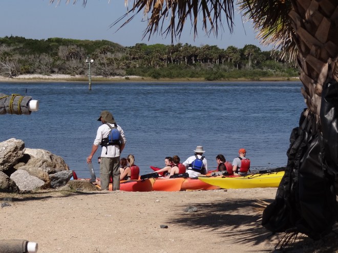 Kayakers receive instructions before heading out.