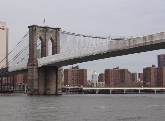 The Brooklyn Bridge spans the East river
