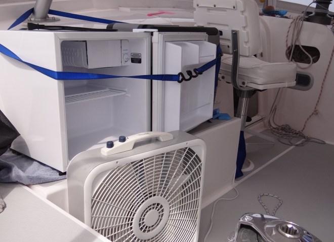 Cockpit Left: fridge and freezer, box fan. Ready to cool the food and us!