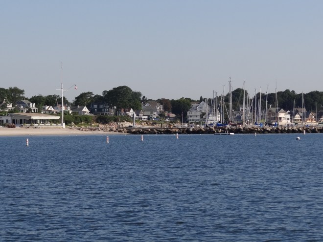 Yacht Cub behind breakwater, to the left is an association beach