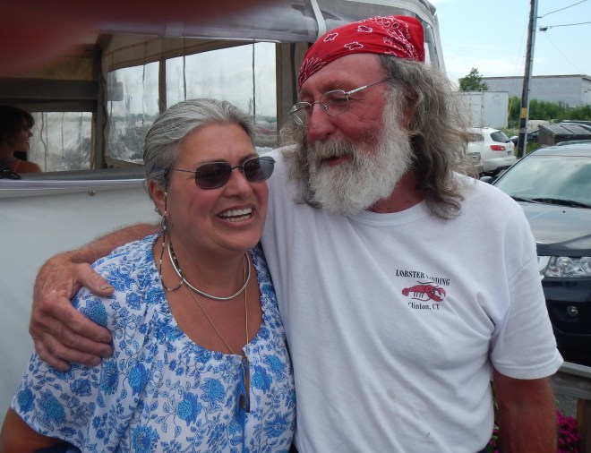 Kerry schmoozes with the owner of Lobster Landing.