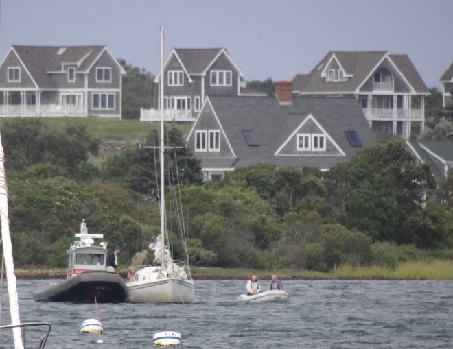 At max zoom: can make out Russ on Ms Viv. A second dinghy stands by