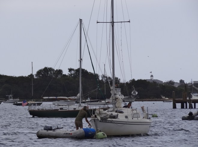 Providing mooring attachment assistance- oh wait, more water- go to dock.