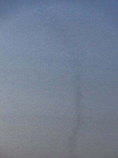 You can just see the large dark mass in the upper left and the long funnel down