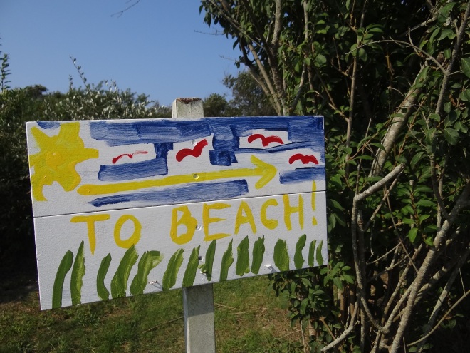 Sign by the seasonal Coast Guard station at the entrance to New Harbor