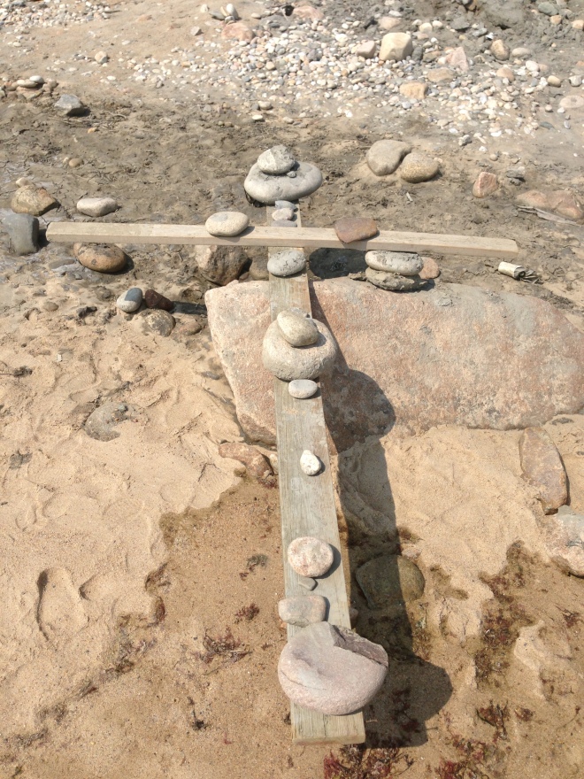A balancing cross cairn