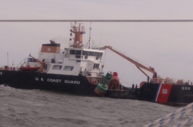 Coast Guard buoy tender moving buoys in the Bay near Annapolis