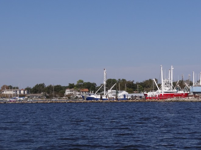 Looking at the breakwater and commercial fishing vessels inside as we approach
