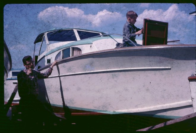 Russ and his dad work on the Omar K in the yard at Morris Cove Marina
