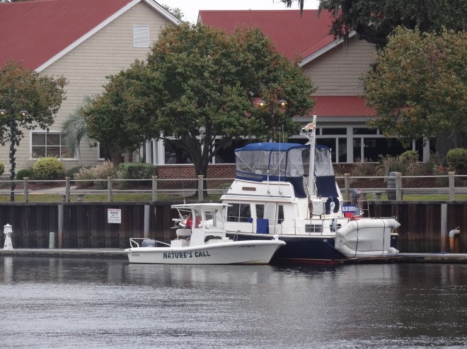 The local pump out boat at work- love the name!