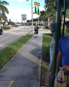 We are entertained while waiting for the bus back to the marina