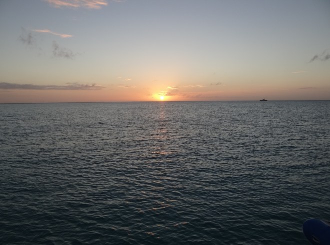 Black Point Sunset - Bahamas Defense vessel stands watch