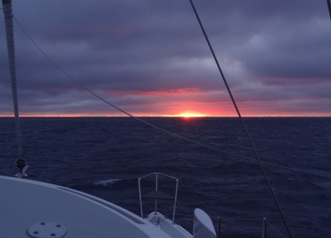 As we turn East away from the Florida coast, the sun peeks out from the Bahamas