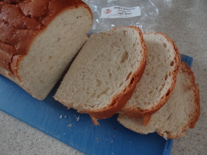 George Town Mom's coconut bread. Fresh grated coconut meat is throughout the loaf