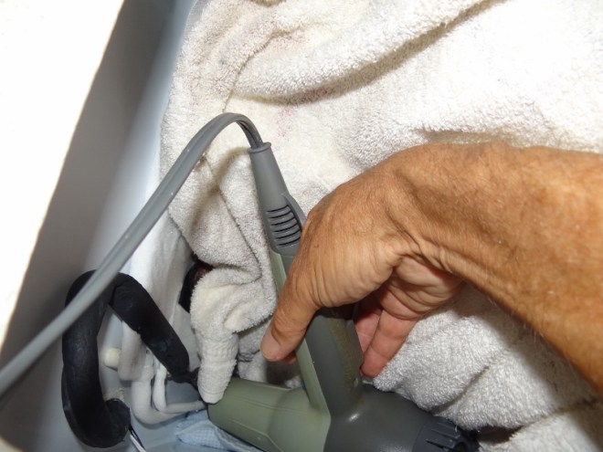 Even the hair dryer serves a dual purpose aboard