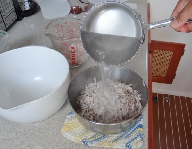 Boil the milk from one coconut with water, then pour over shredded coconut and let steep