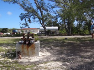 Fuel hose receptacle on the beach in New Bight