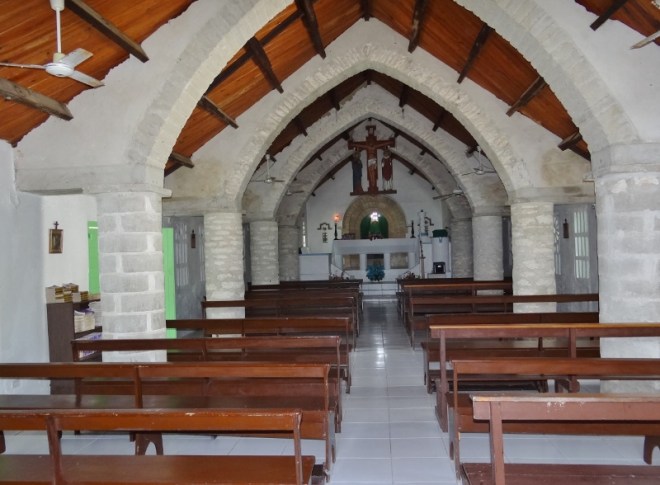 Beautiful interior with several tiny enclaves in the side walls and Bapistry a half-level down