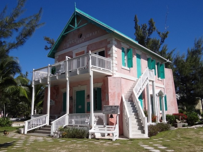 Multi-story Haynes Library sits at the harbor's edge