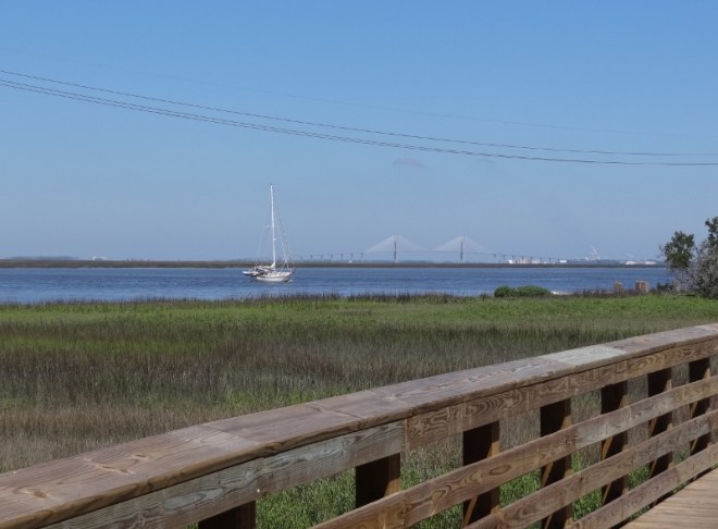 A sailboat heads up Jekyll Creek-probably at mid tide or better