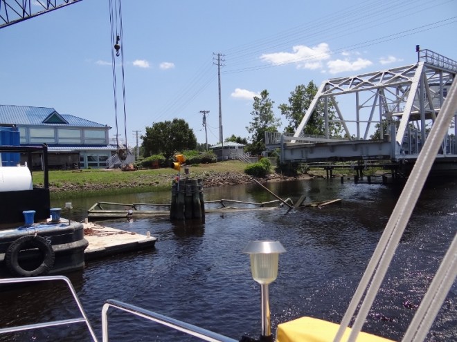 A barge came by (at night?) and mowed down the fender system and pilings.