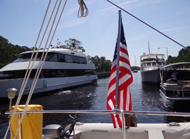 We lead the pack of  seven boats in the lock. New pontoon owner was getting a lock transit demo