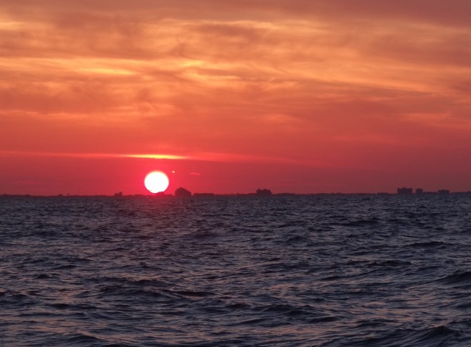 The sun sets along the Maryland shore as we approach the mouth of the Delaware