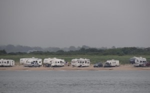 A long line of trailers lined the beach