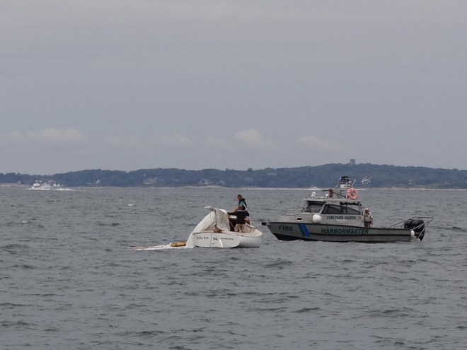 Julia Lee receives help from the harbormaster