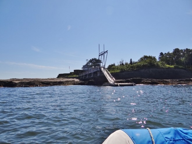We approach the dinghy dock. Boy that's a steep ramp up, thanks to nearly low tide