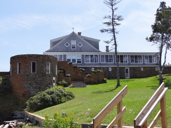 The Peary summer home with circular stone study to left
