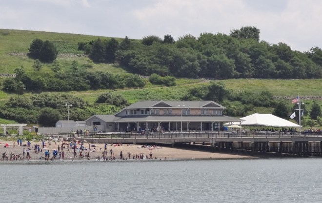 Groups of city kids enjoy a beach day on Spectacle