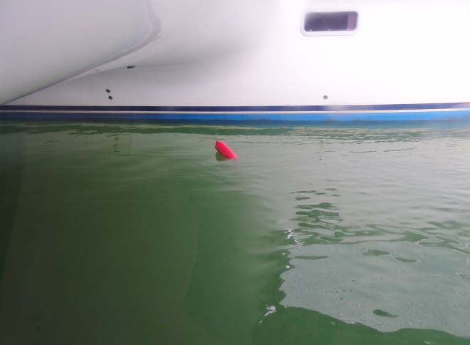 Oh there it is! Sure, between the hulls- how about way out in front?