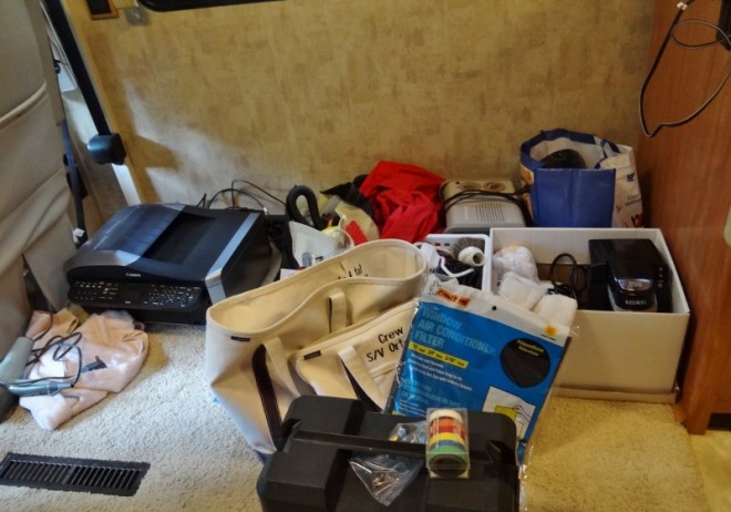 Space where a small sofa once lived made for a convenient dumping place