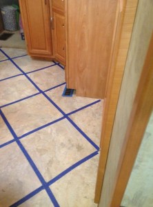 So many days would pass until we could grout that we taped the openings to keep out debris