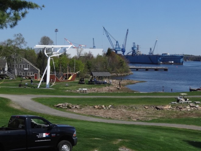 The huge dry dock at Bath Ironworks is visible in the background