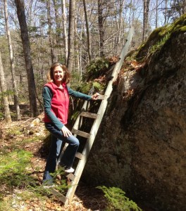 I begin the ascent up the erratic glacial boulder. 