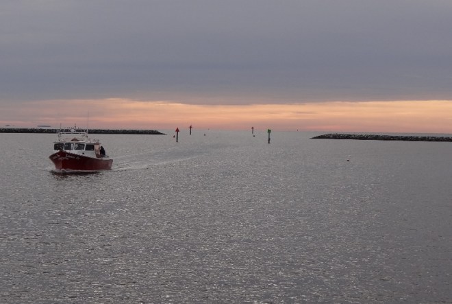 Calm behind Herrington Harbor's breakwater as we depart