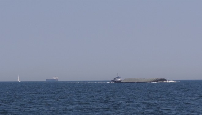 Sharing the Bay- ship in backgrnd nearly 1,000ft long with 37ft draft