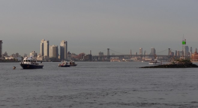 On the Roosevelt Island side, more enforcement vessels wait to enforce the 9am west channel closure
