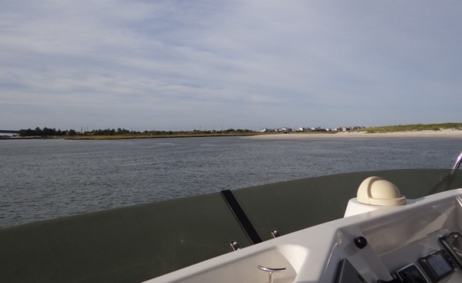 We are heading for the narrow cut between the grass and the beach