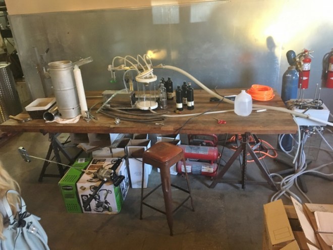 The very basic low tech bottling table- 4 peeps gets the job done
