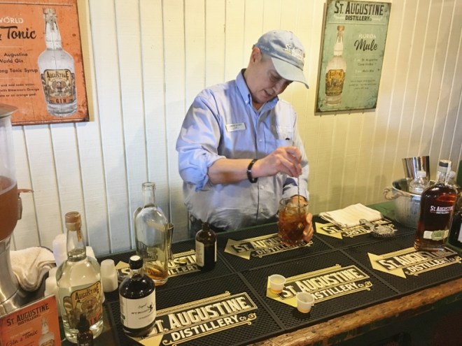 In the gift shop another man creates Gin & Tonic and Old Fashioned